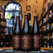 Rey Árbol Betulita Mocha con etiqueta oscura y diseño de arte ritual, mostrando un personaje con tercera visión. Mocha Stout artesanal de 7.0% ABV con aromas a café y chocolate, ideal para postres intensos o carnes ahumadas.