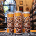 Lata de Rey Árbol Mosaico Mágico, una DDH Doble IPA Brumosa de Rey Árbol. La etiqueta presenta un diseño artístico inspirado en mosaicos, con tonos cálidos y detalles en ramas. Ofrece aromas de mango, piña y papaya, con un sabor equilibrado entre dulzor y amargor. Ideal para maridar con platos picantes, carnes a la parrilla y quesos maduros.